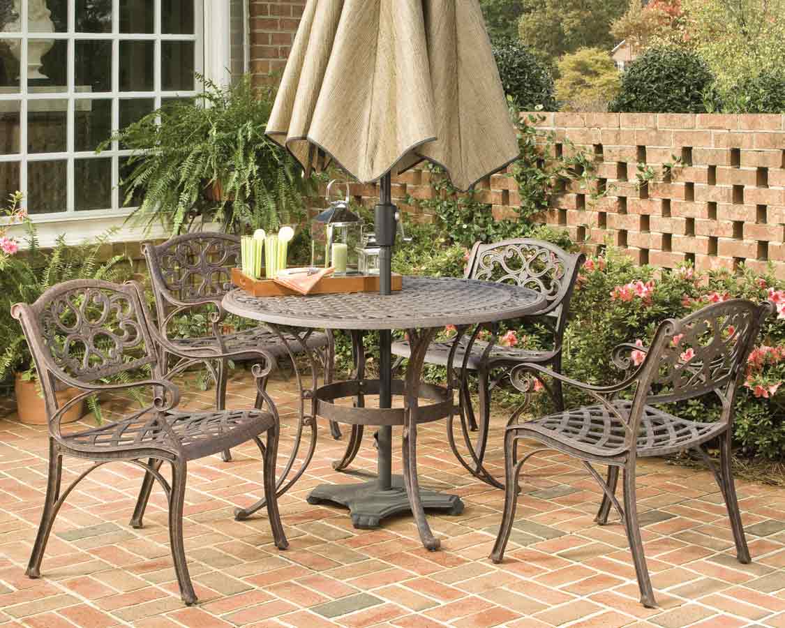 Home Styles Rust Brown 42 Inch Round Outdoor Dining Collection with Arm Chair